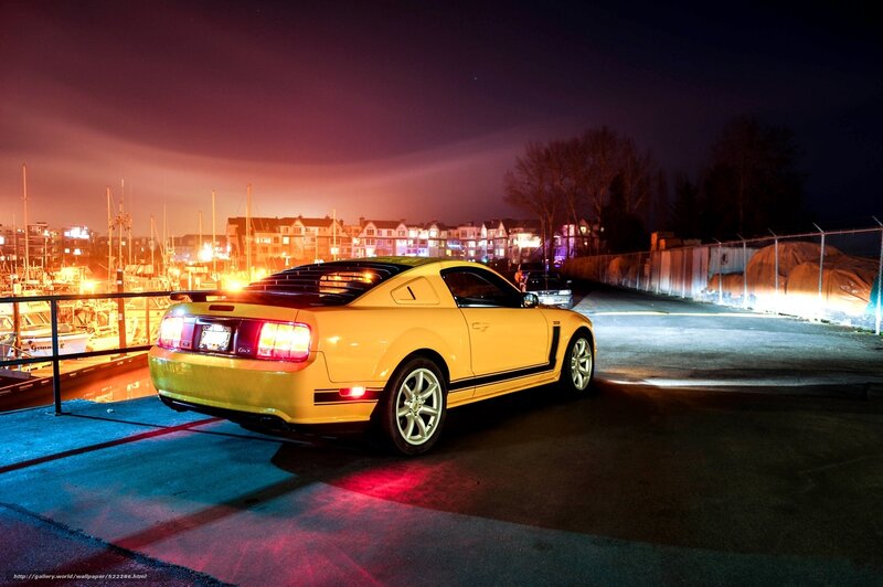 Yellow Mustang at a marina