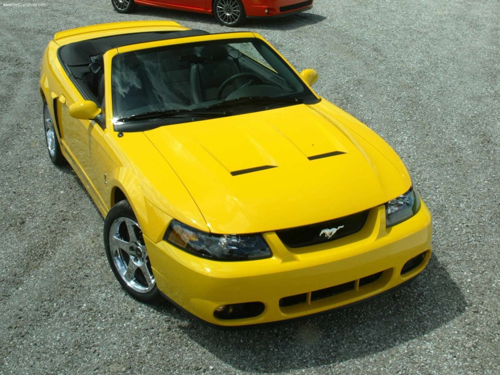 yellow mustang convertible