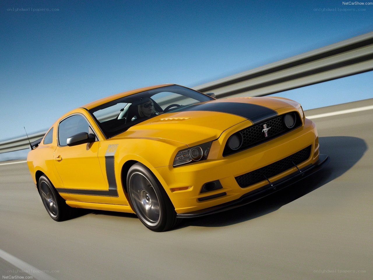 yellow mustang on highway