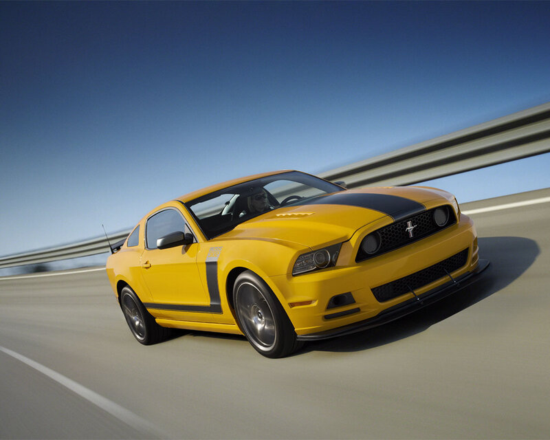 Yellow Mustang on Road