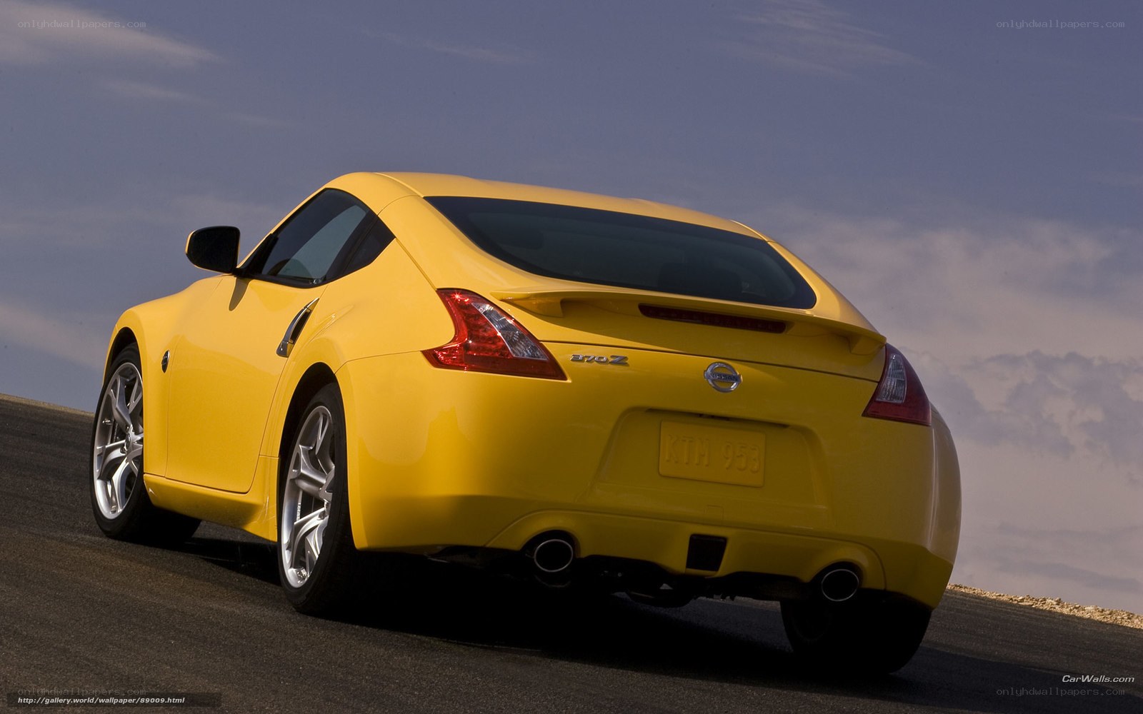 yellow nissan 370z sports car