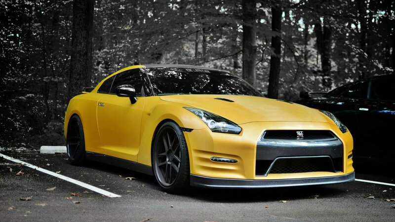 yellow nissan gt-r in forest