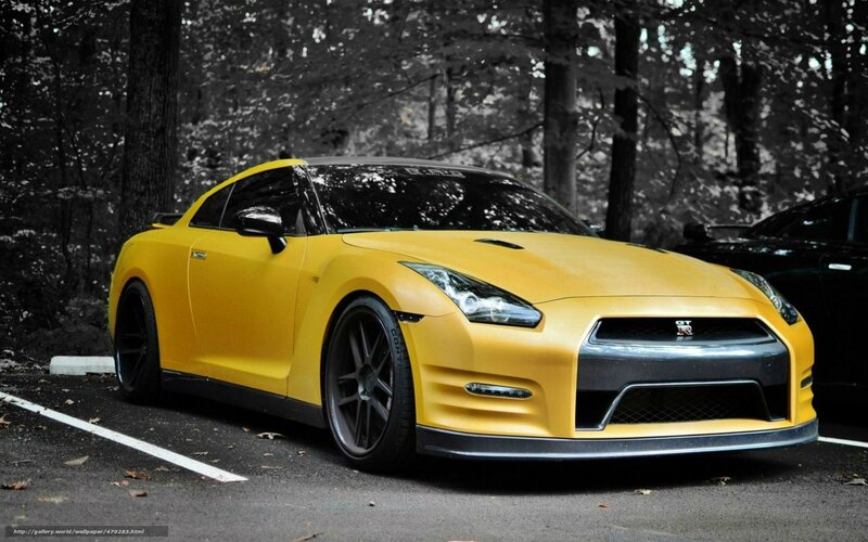 Yellow Nissan GT-R in forest
