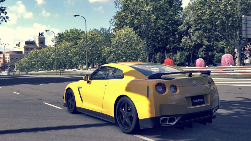 yellow nissan gt-r on city street