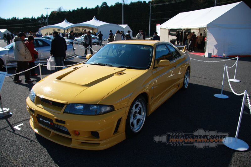Yellow Nissan Skyline at car show