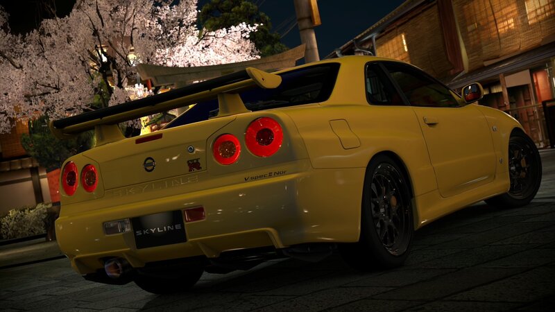 Yellow Nissan Skyline at night