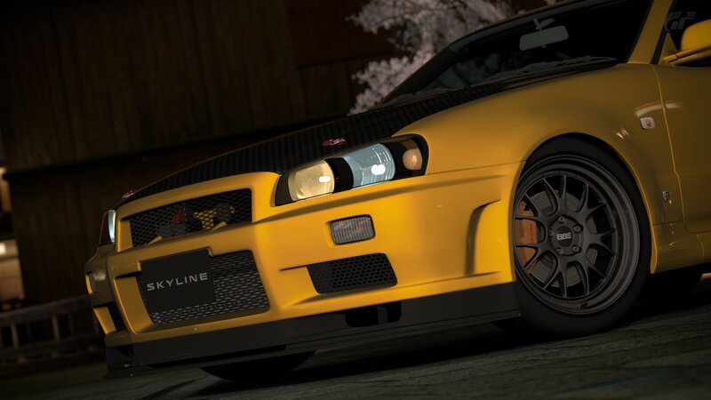 yellow nissan skyline at night