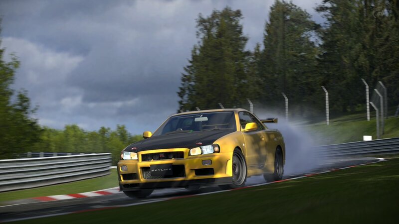 yellow nissan skyline drifting