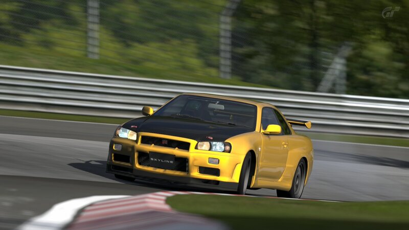 yellow nissan skyline on racetrack
