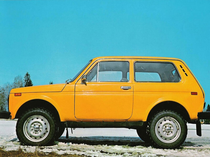 Yellow off-road car in snow