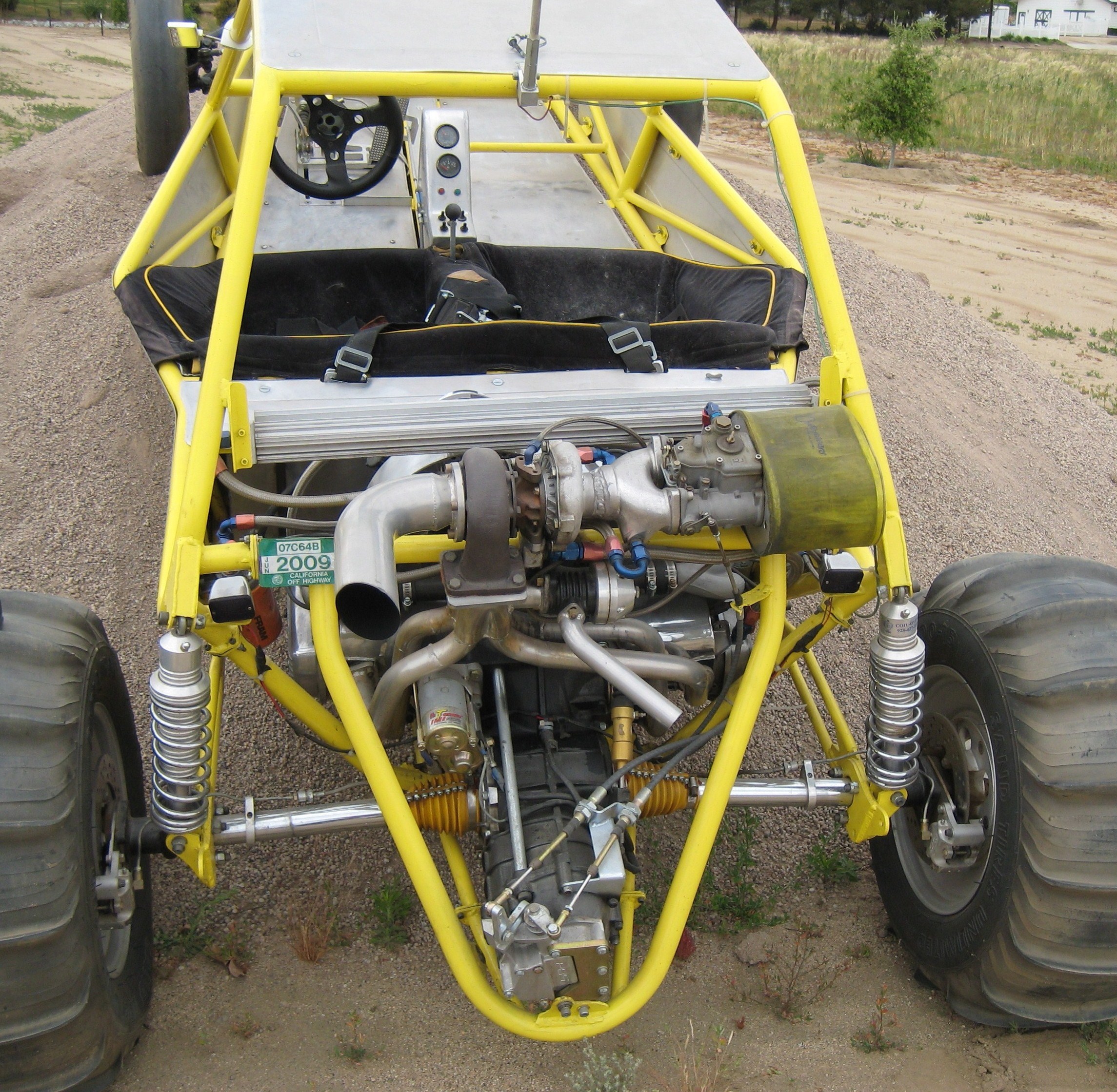 yellow off-road race car