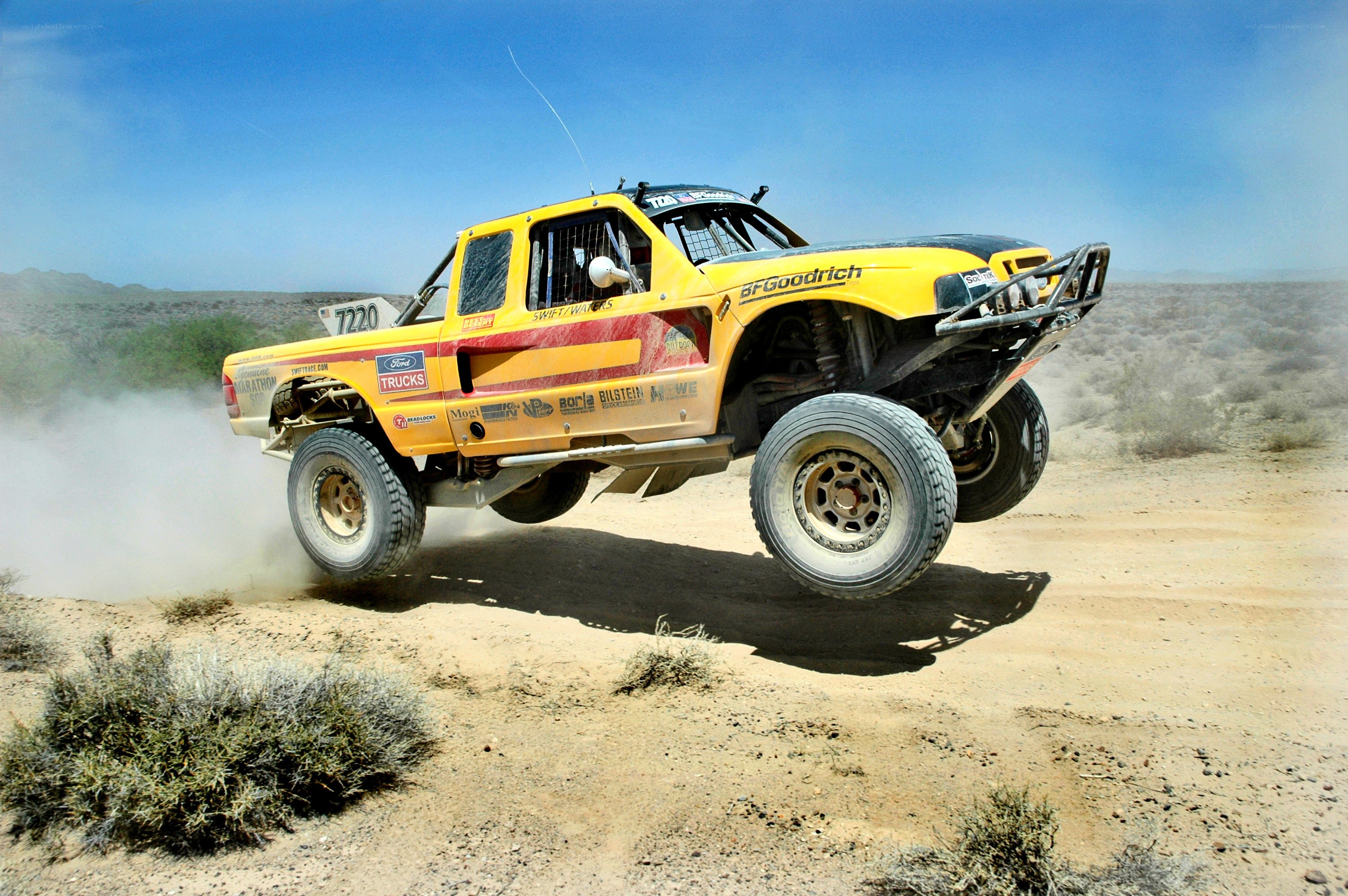 Yellow off-road truck racing