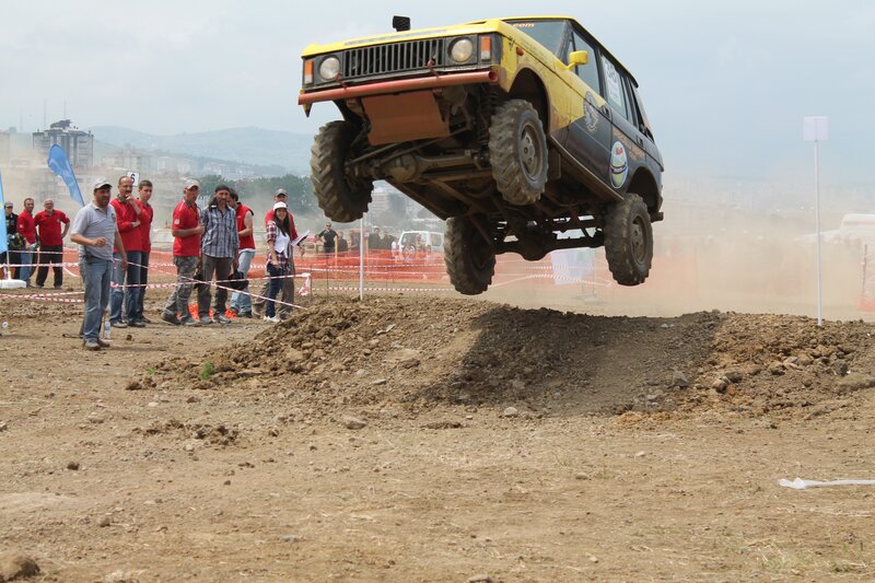 Yellow Off-road Vehicle — Brown, Action-packed