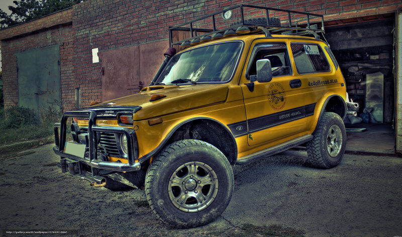 Yellow off-road vehicle in garage