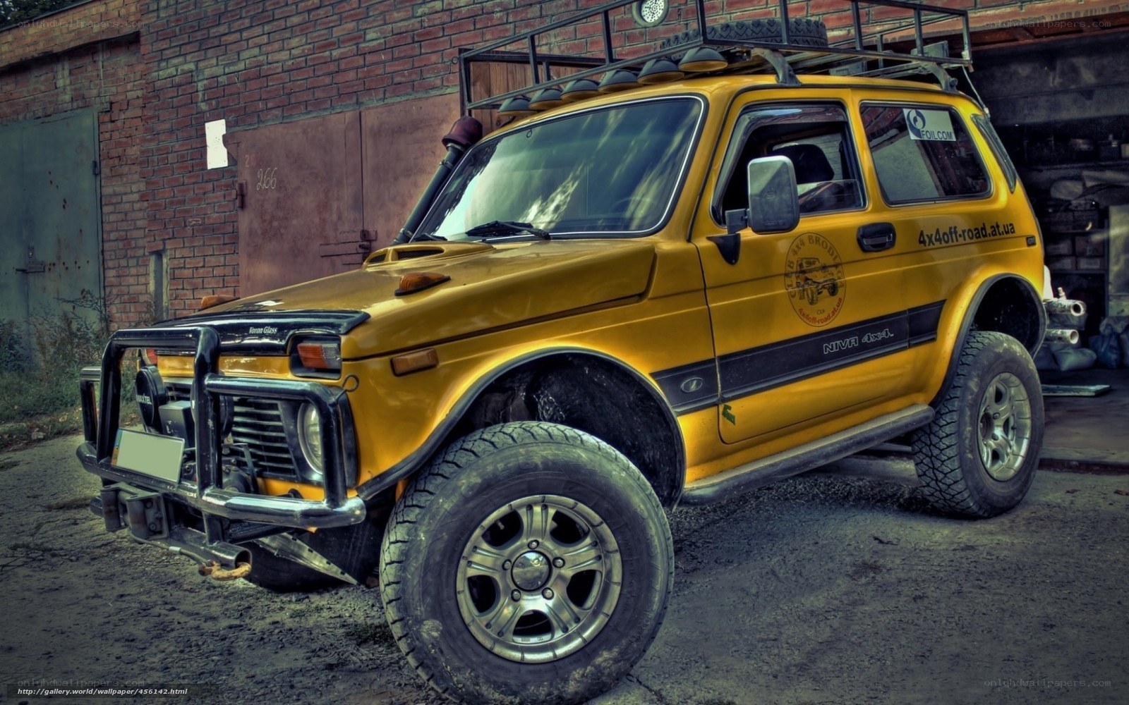 Yellow off-road vehicle parked
