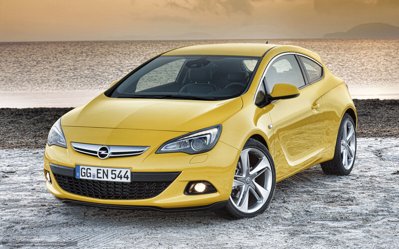 Yellow Opel Astra Car