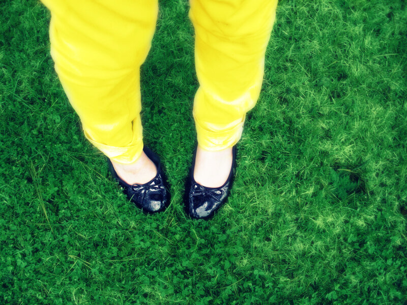 yellow pants on grass