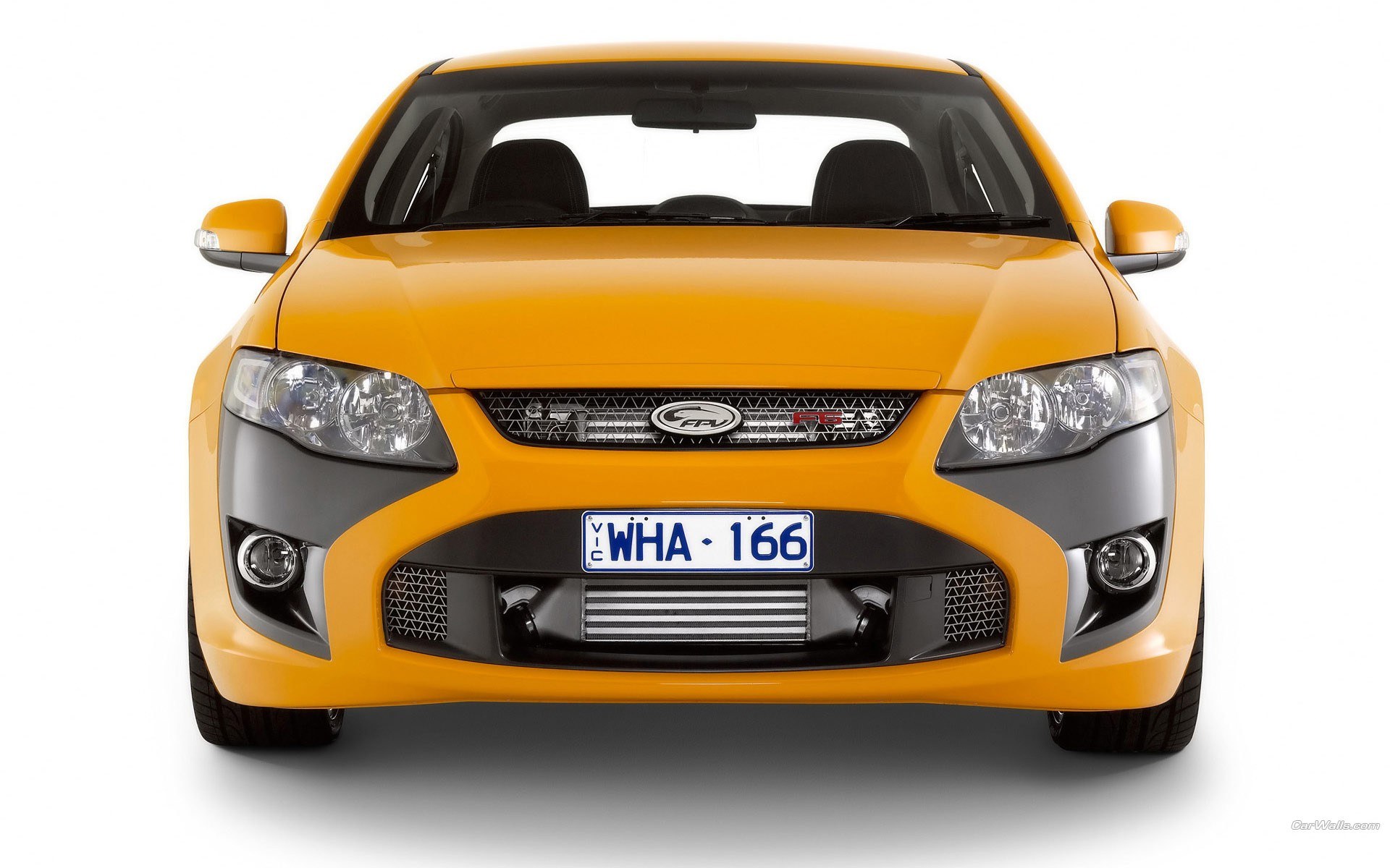 yellow performance car front view