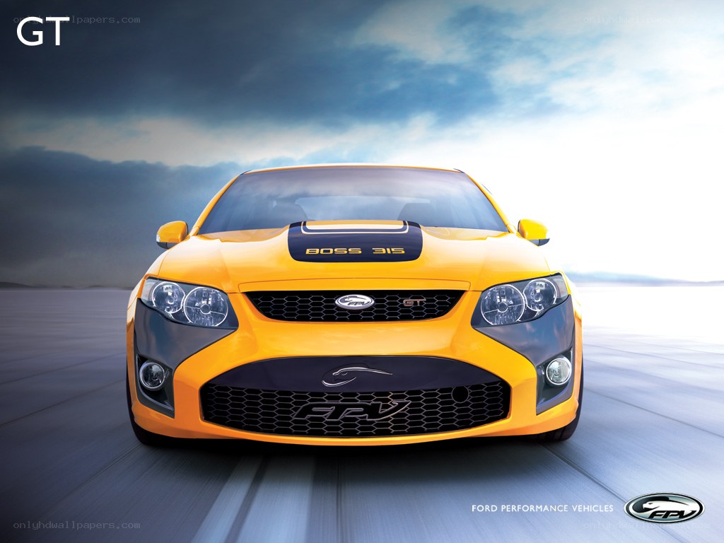 yellow performance car on track