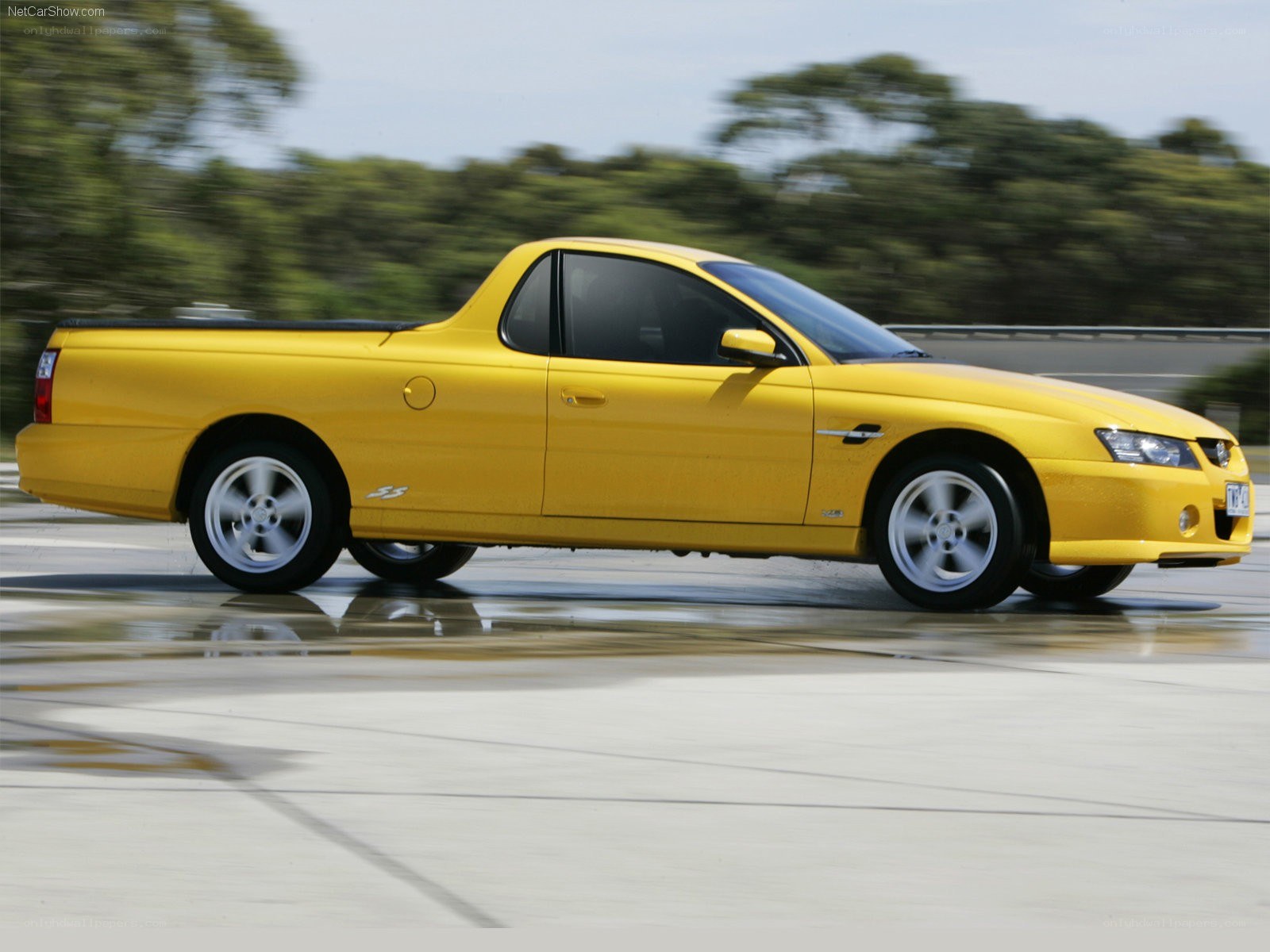yellow performance pickup truck