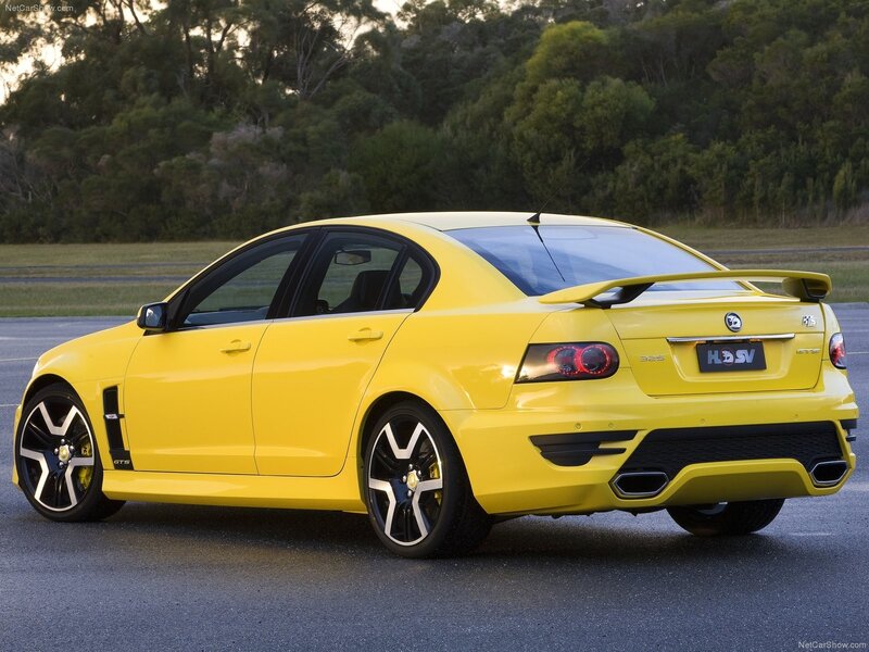 Yellow Performance Sedan — Dramatic, Sunset