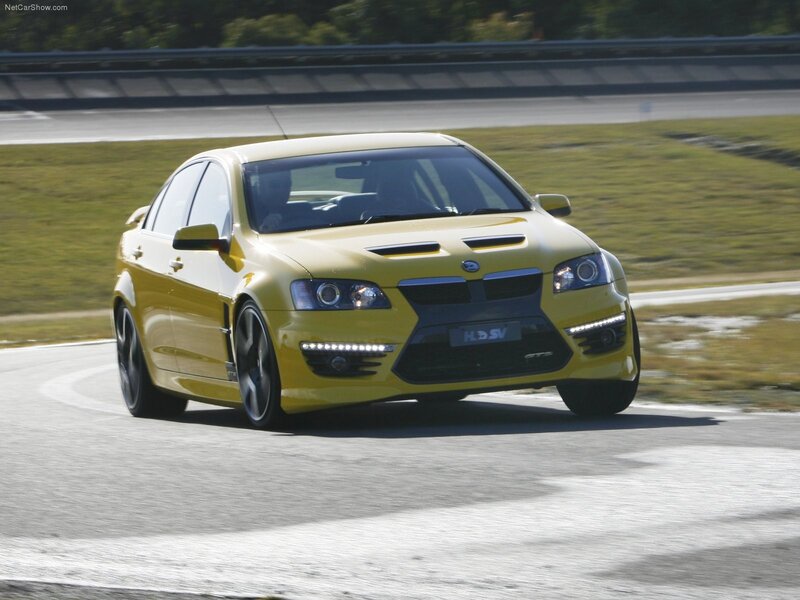 Yellow Performance Sedan — Dynamic, Afternoon
