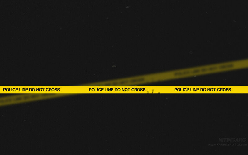 yellow police tape on black background