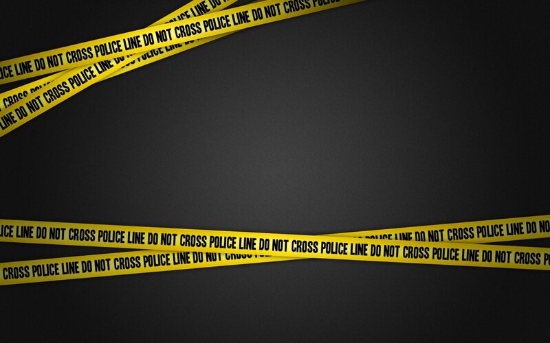 yellow police tape on black background