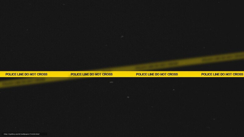 yellow police tape on black