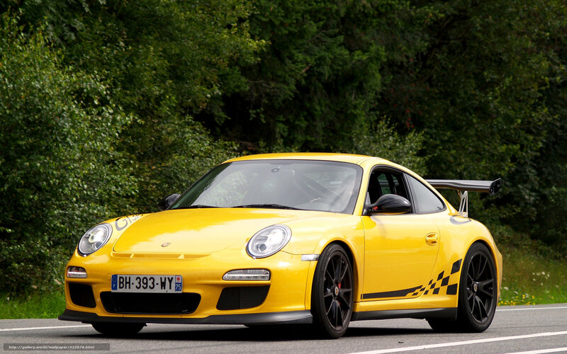 yellow porsche 911 gt3 on road