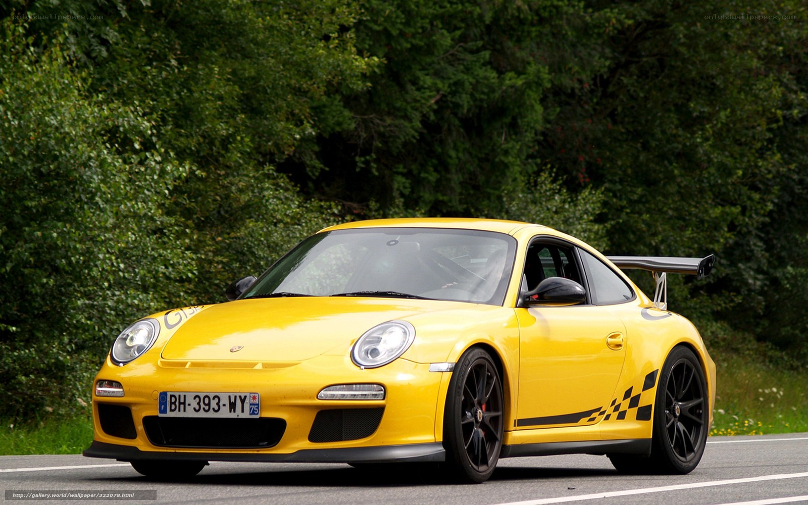 yellow porsche 911 gt3 on road