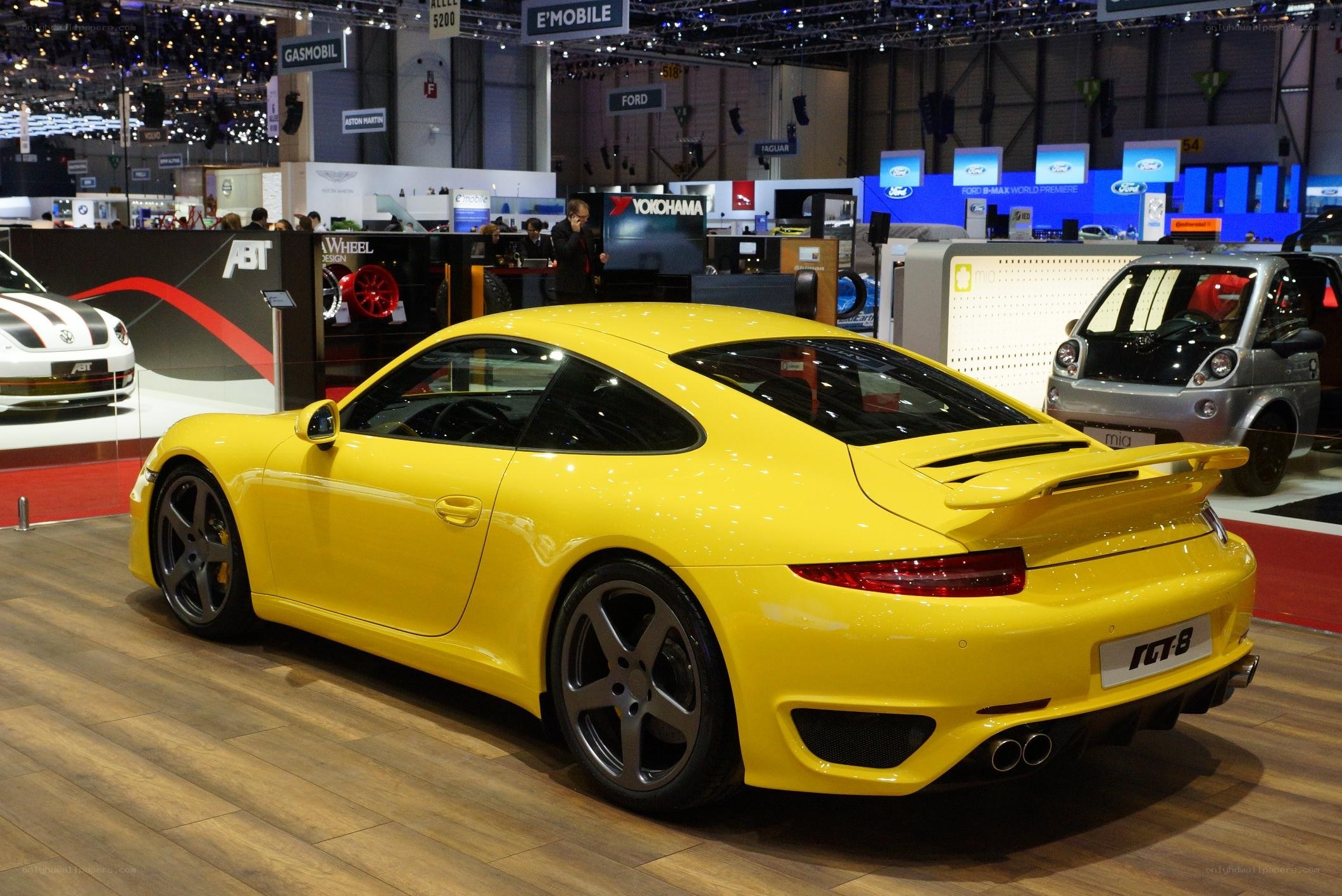 Yellow Porsche at auto show