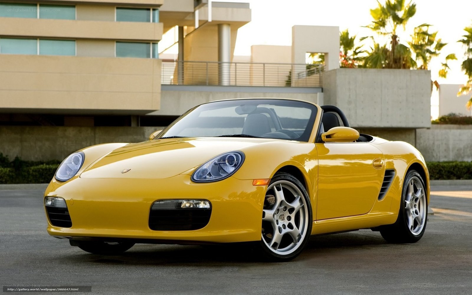 Yellow Porsche Boxster parked