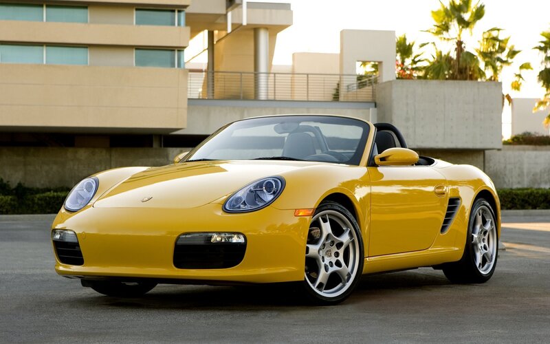 Yellow Porsche Boxster sports car