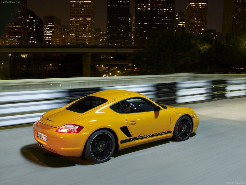 Yellow Porsche Cayman S at night