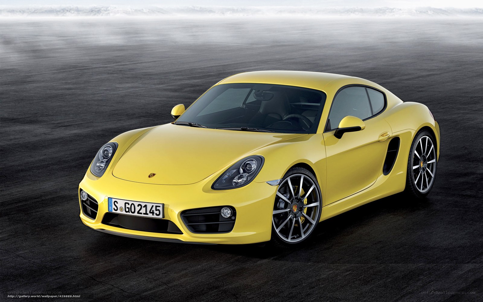 Yellow Porsche Cayman sports car
