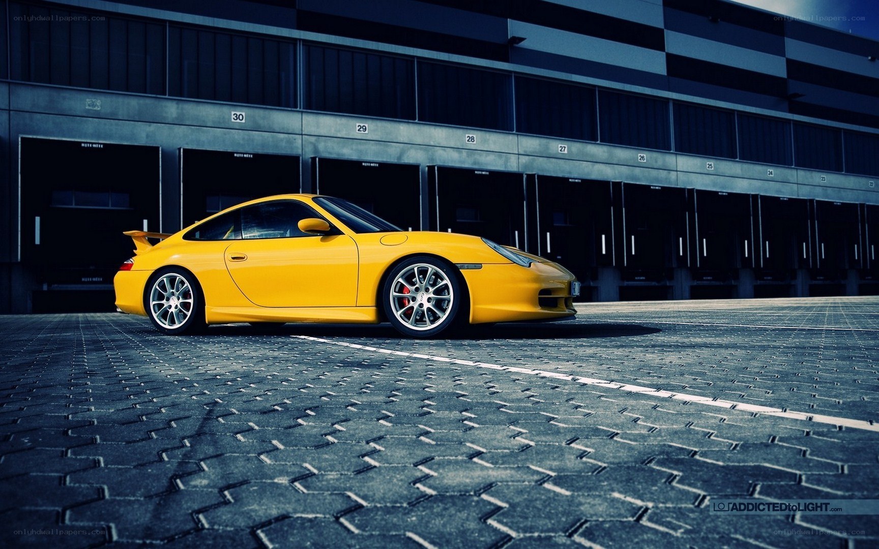 Yellow Porsche in a garage