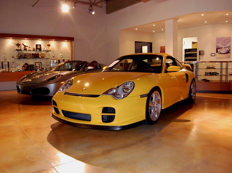 Yellow Porsche in showroom