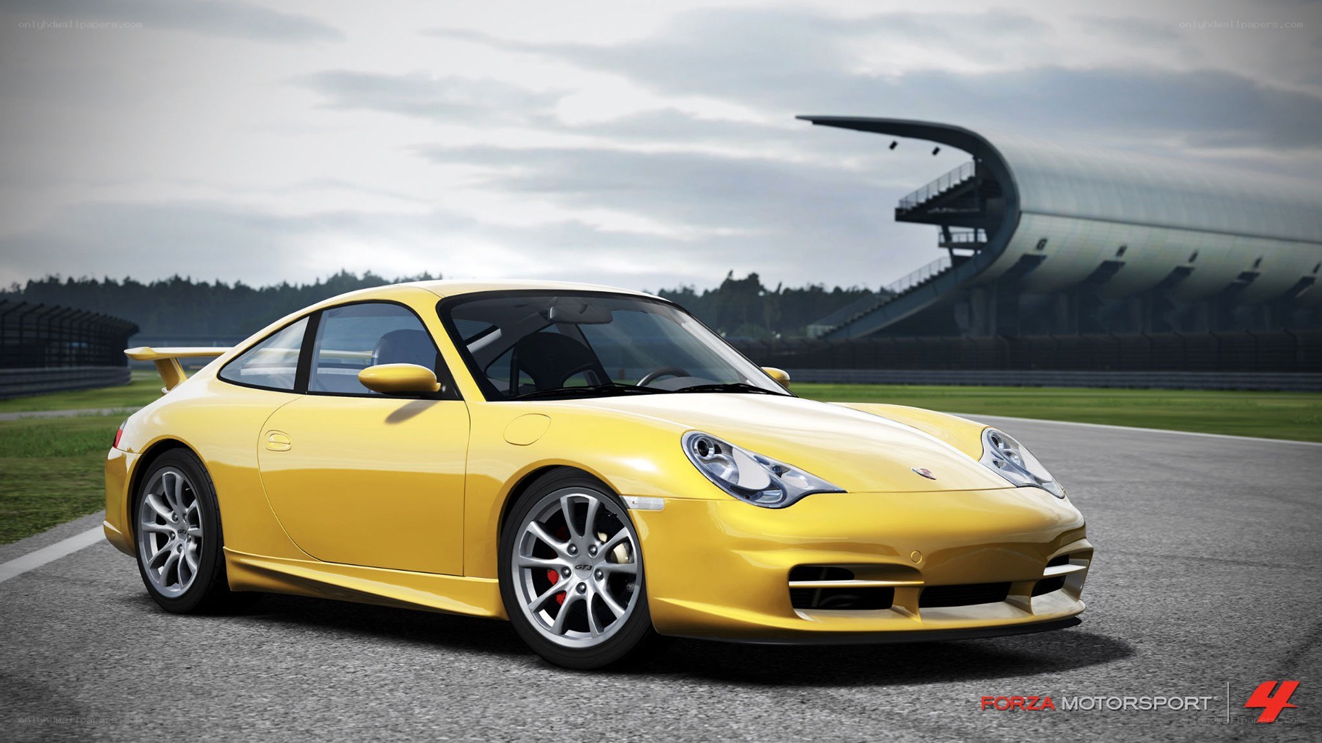 yellow porsche on racetrack