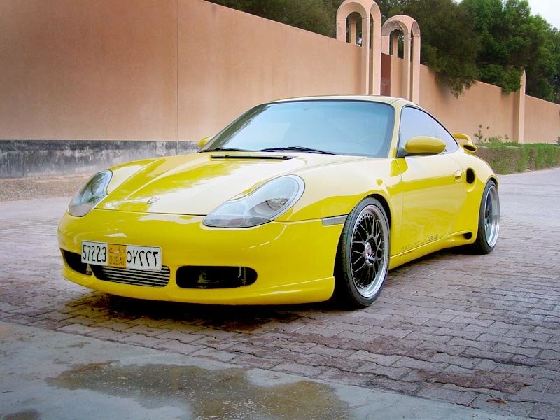 yellow Porsche sports car