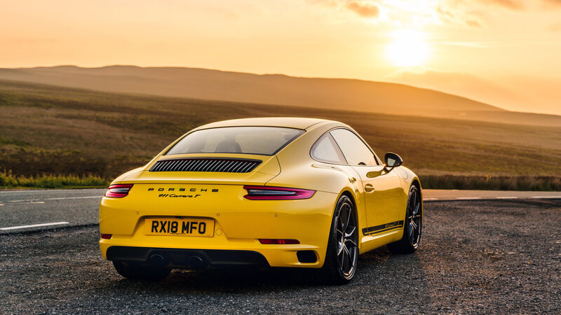 Yellow Porsche Sports Car — Serene