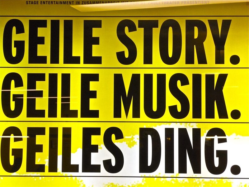 Yellow poster with bold text