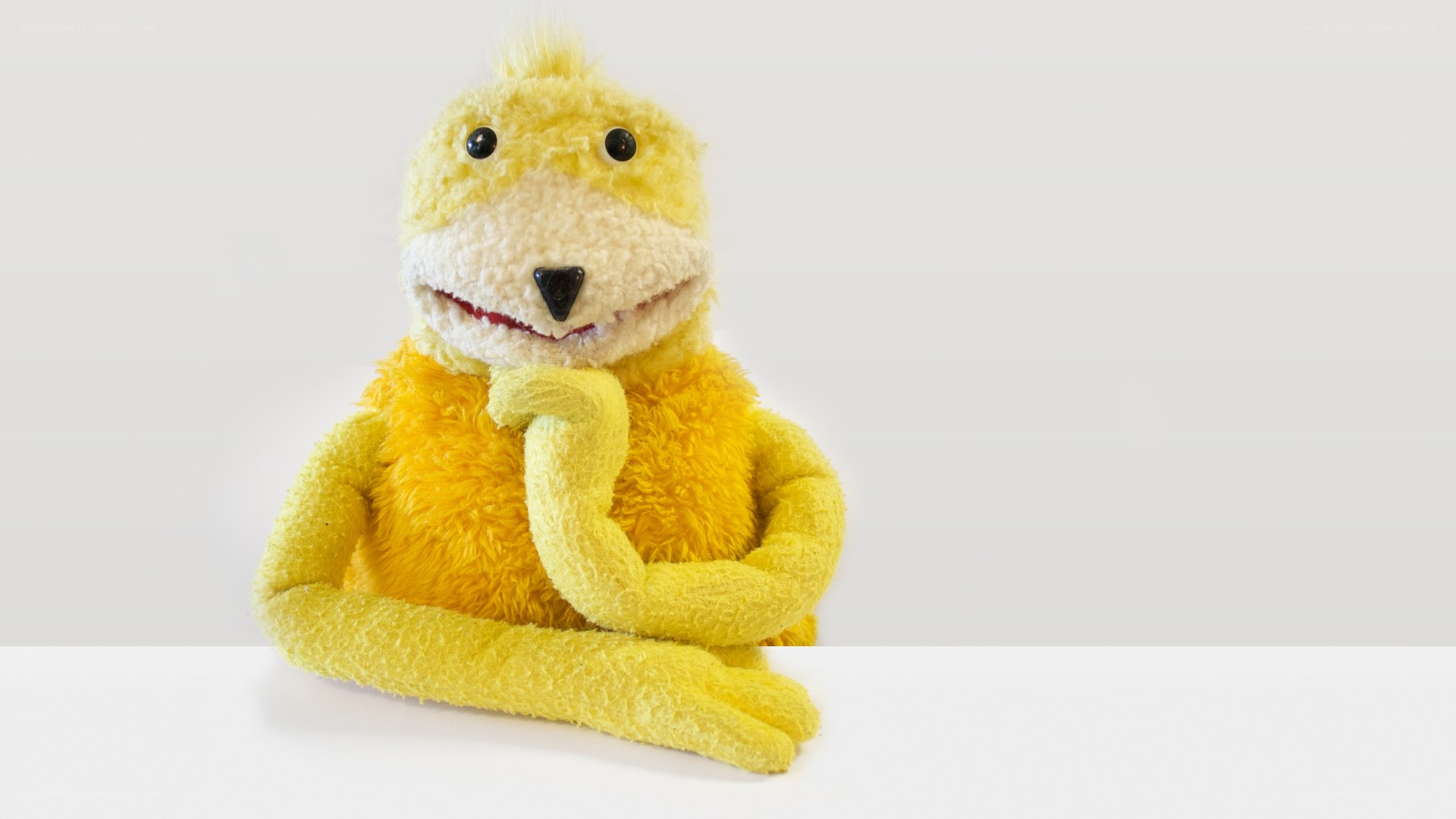 yellow puppet thinking