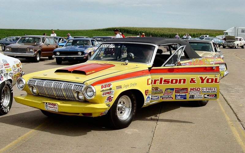 Yellow race car at a show