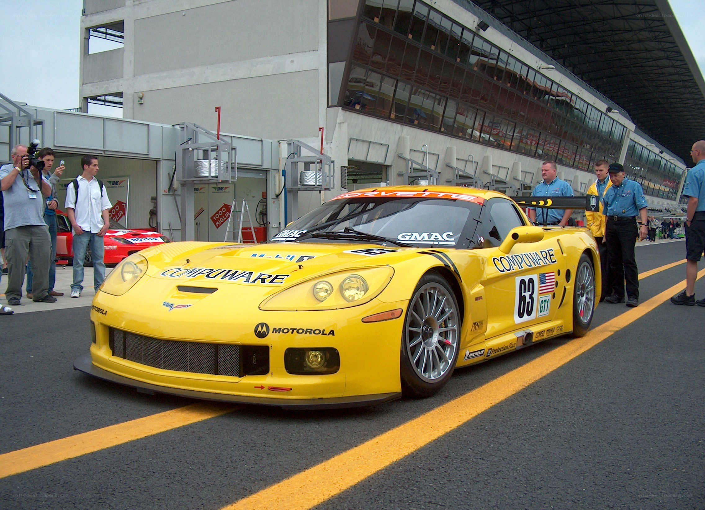 Yellow race car at a track
