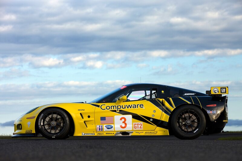 Yellow Race Car — Dramatic, Afternoon, Photograph, Race Car, Sky, Track