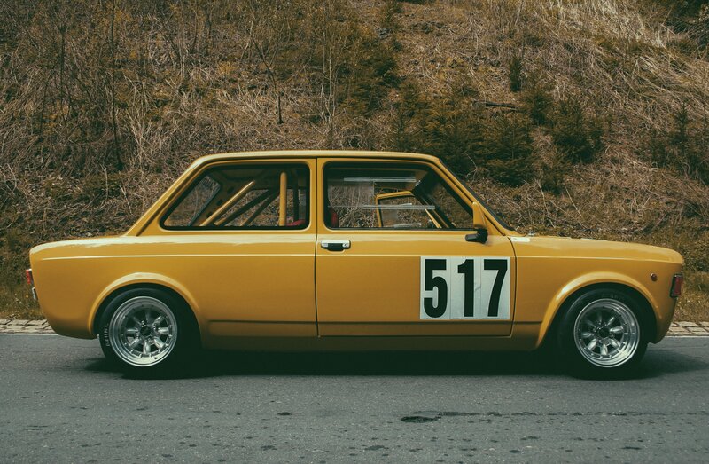 Yellow Race Car — Dramatic, Afternoon, Photograph, Road