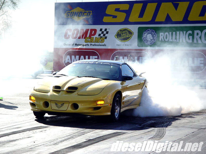 Yellow Race Car — Dramatic, Afternoon, Photograph, Smoke