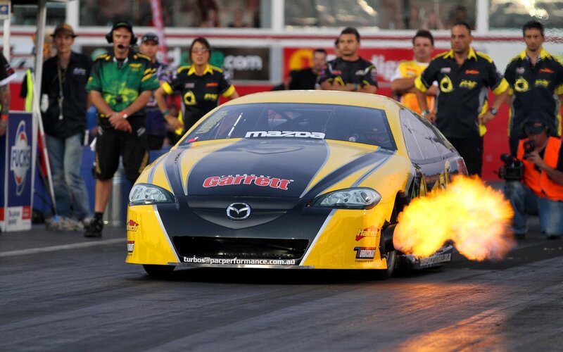 Yellow Race Car — Dramatic, Night, Photograph, Flames