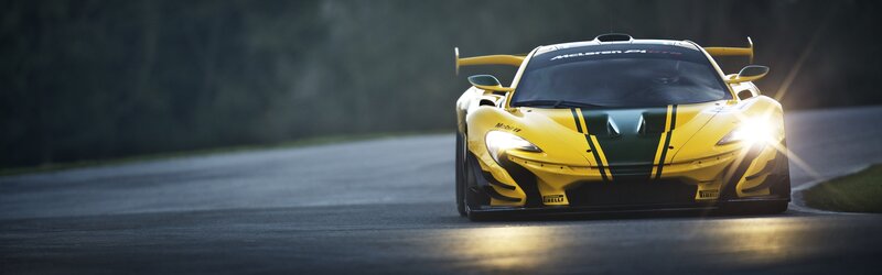 Yellow Race Car — Dramatic, Night, Photograph, Race Track
